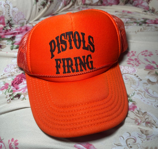 Pistols Firing Trucker Hat